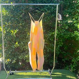 FP Movement romper. Size L. Pastel colors. Perfect condition.